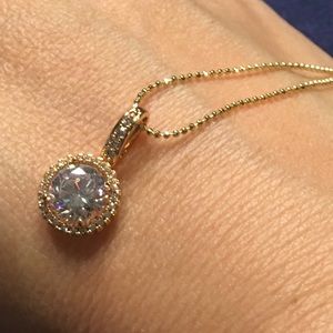 Gold plated 12mm cz necklace w cz pave trim.